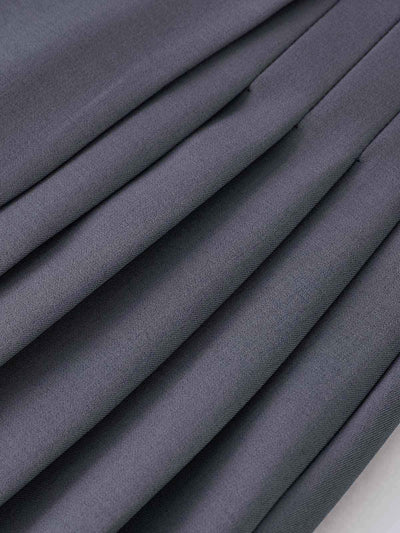 Mila | Faltenrock in Wolloptik mit High Waist & Knopfdetails