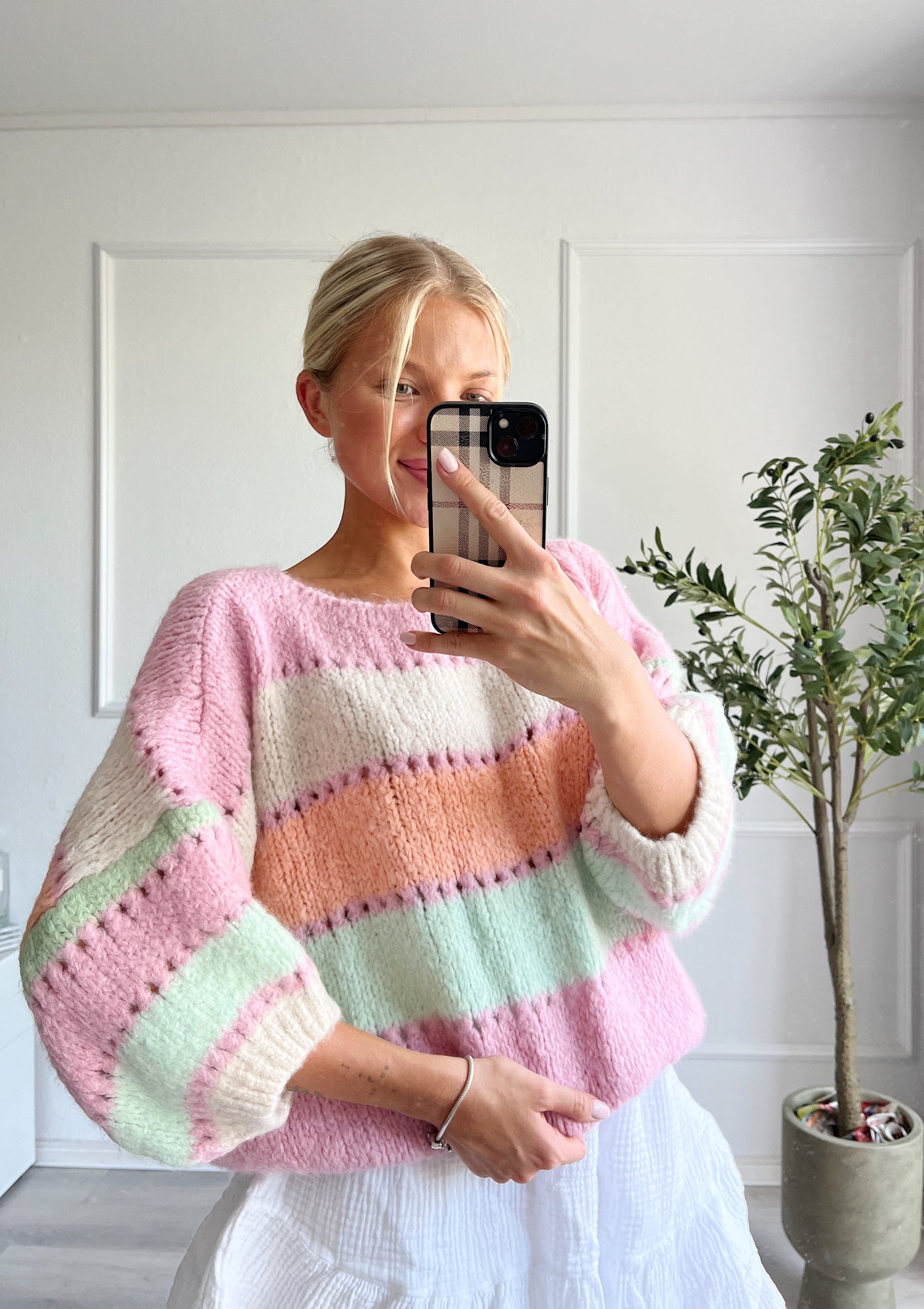 Pastellfarbener Pullover
