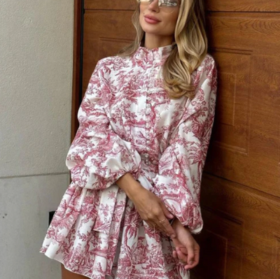 Elegantes Sommerkleid mit Puffärmeln & Plisseerock