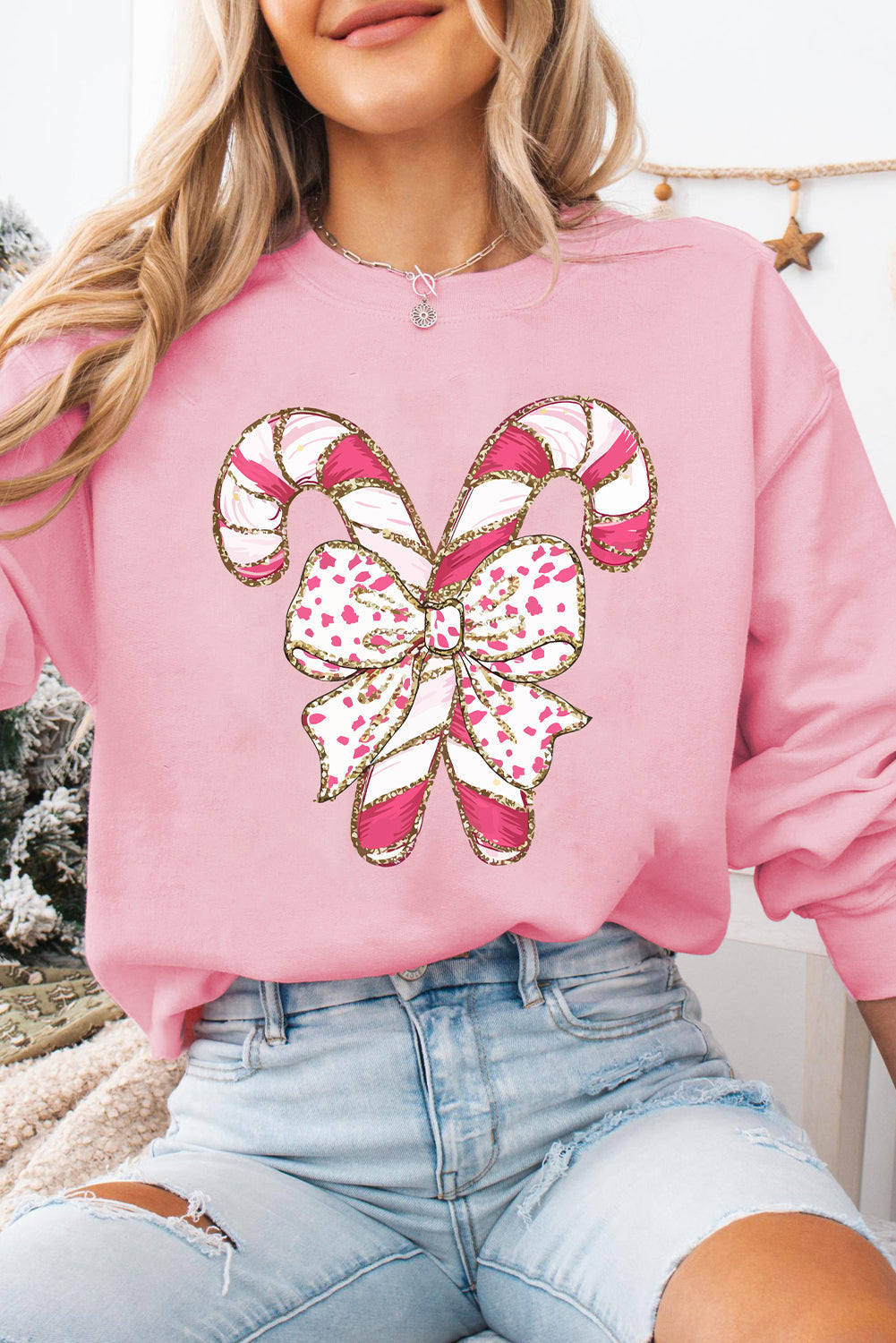 Emilia® | Sweatshirt mit hängenden Schultern, Weihnachtsgrafik und rosa Schleife