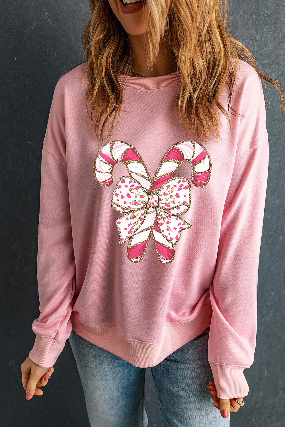 Emilia® | Sweatshirt mit hängenden Schultern, Weihnachtsgrafik und rosa Schleife